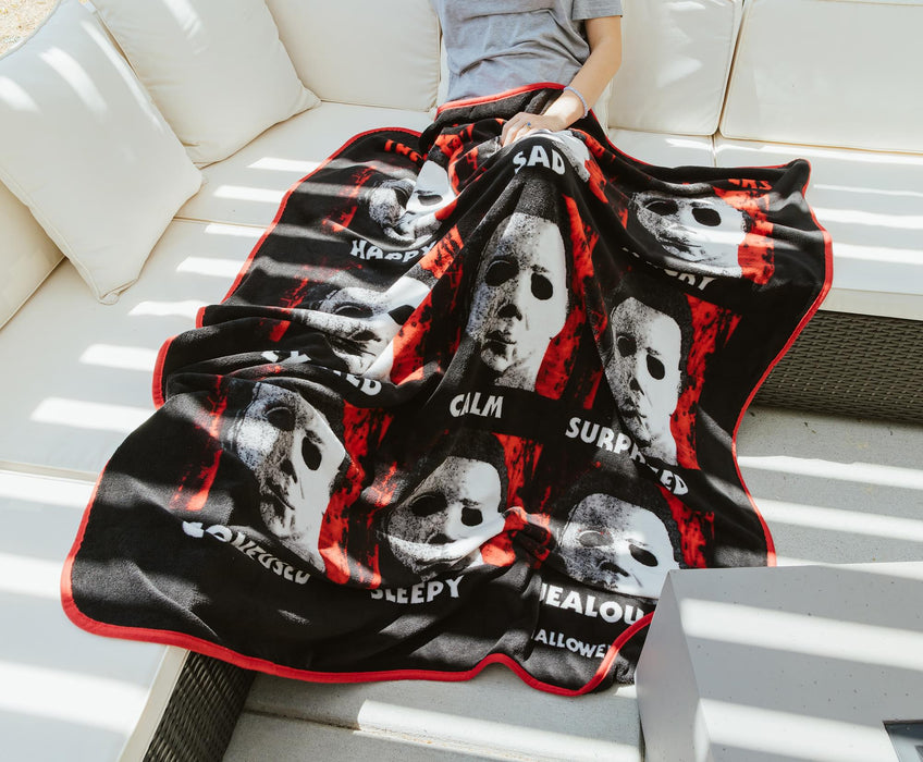 Halloween II "The Faces Of Michael Myers" Raschel Throw Blanket | 45 x 60 Inches
