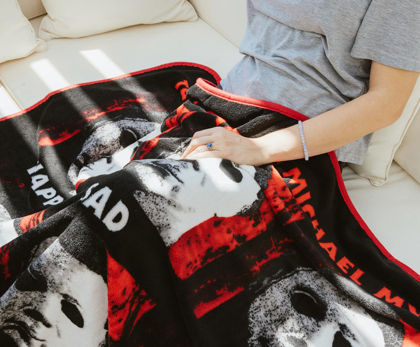 Halloween II "The Faces Of Michael Myers" Raschel Throw Blanket | 45 x 60 Inches