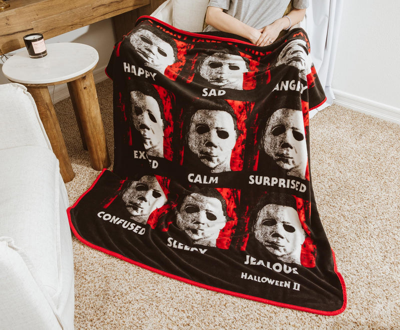 Halloween II "The Faces Of Michael Myers" Raschel Throw Blanket | 45 x 60 Inches