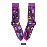 A pair of purple crew socks with a brick pattern and cartoon character prints of Svengoolie and the Sven Squad.