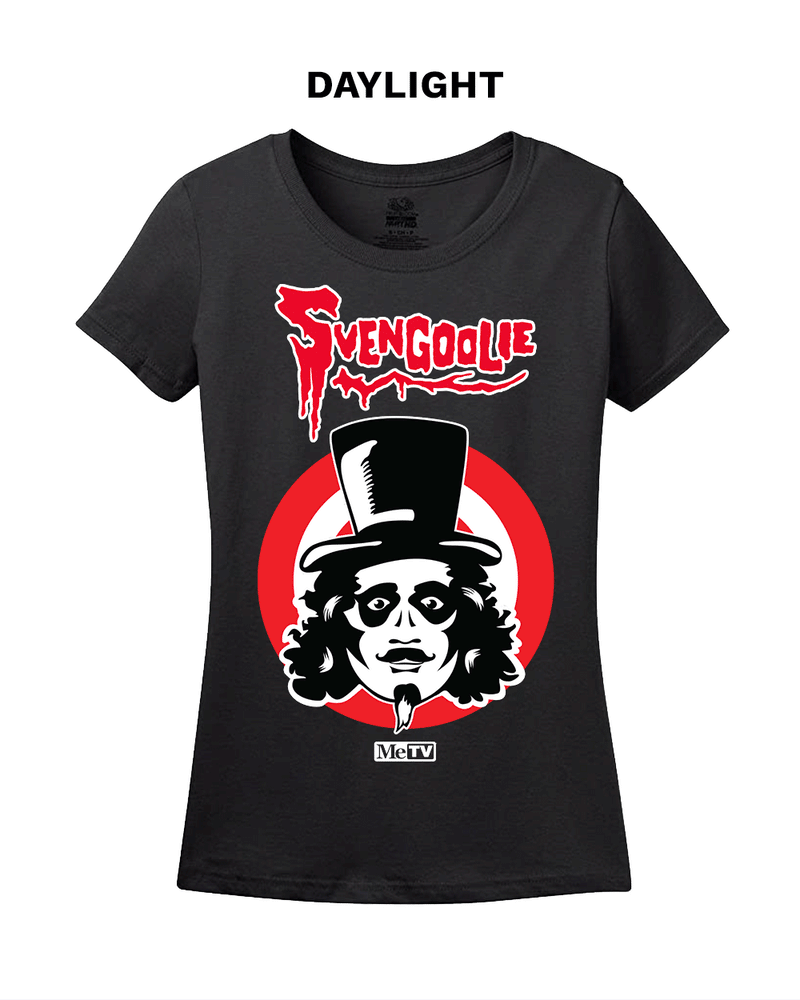 Black women's fitted short-sleeved t-shirt featuring the Svengoolie face logo in a red circle with the text 'Svengoolie' in red above it and a small MeTV logo below.