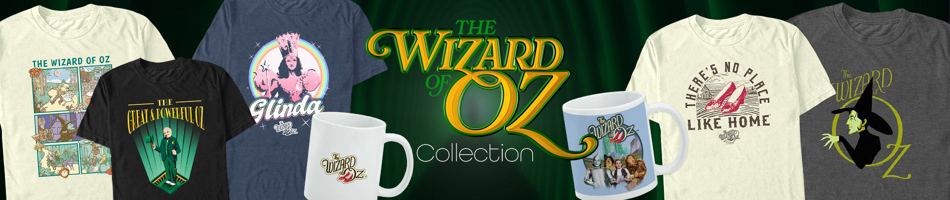 A promotional banner for 'The Wizard of Oz Collection' showing multiple t-shirts, mugs, and a t-shirt graphic in various colors and designs, set against a dark green background with gold lettering.