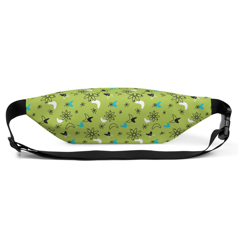 Green fanny pack with a black, white, and turquoise atomic pattern of atoms, starbursts, and boomerangs, black strap and buckle