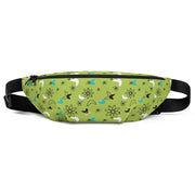 Green fanny pack with a mid-century atomic pattern of black, white, and blue starbursts, atoms, and boomerang shapes, with a black zipper and adjustable black strap.