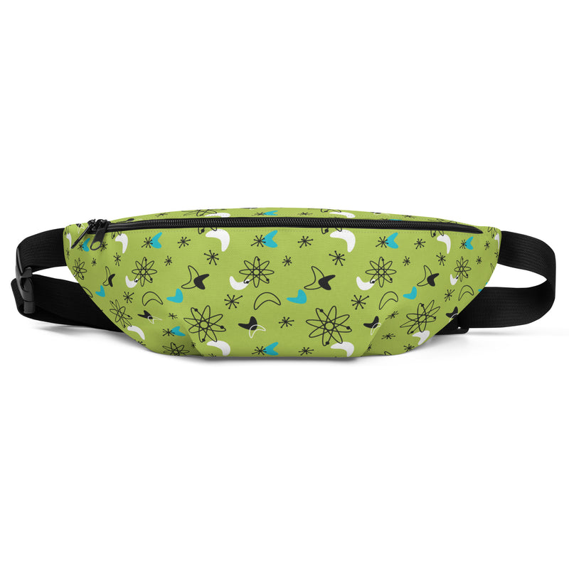 Green fanny pack with a mid-century atomic pattern of black, white, and blue starbursts, atoms, and boomerang shapes, with a black zipper and adjustable black strap.