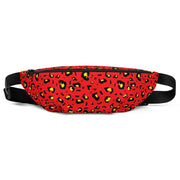Red fanny pack with a black and yellow cheetah spot print, black zipper along the top, and an adjustable black strap.