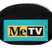 Close-up of black fanny pack with a turquoise front panel featuring the MeTV logo with the text 'MeTV' in black and white on a yellow and black background, with a registered trademark symbol.