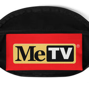 Close-up of a interior pocket of fanny pack featuring a red panel with the MeTV logo