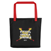 Black tote bag with red handles featuring crossed yellow chickens with the text 'Official Chicken Thrower' in white across the center and a small MeTV logo below.