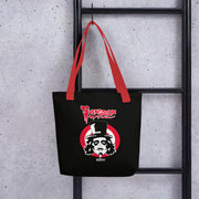 Black tote bag with red handles hanging on a black ladder, featuring the Svengoolie face logo in a red circle with the text 'Svengoolie' in red above it.