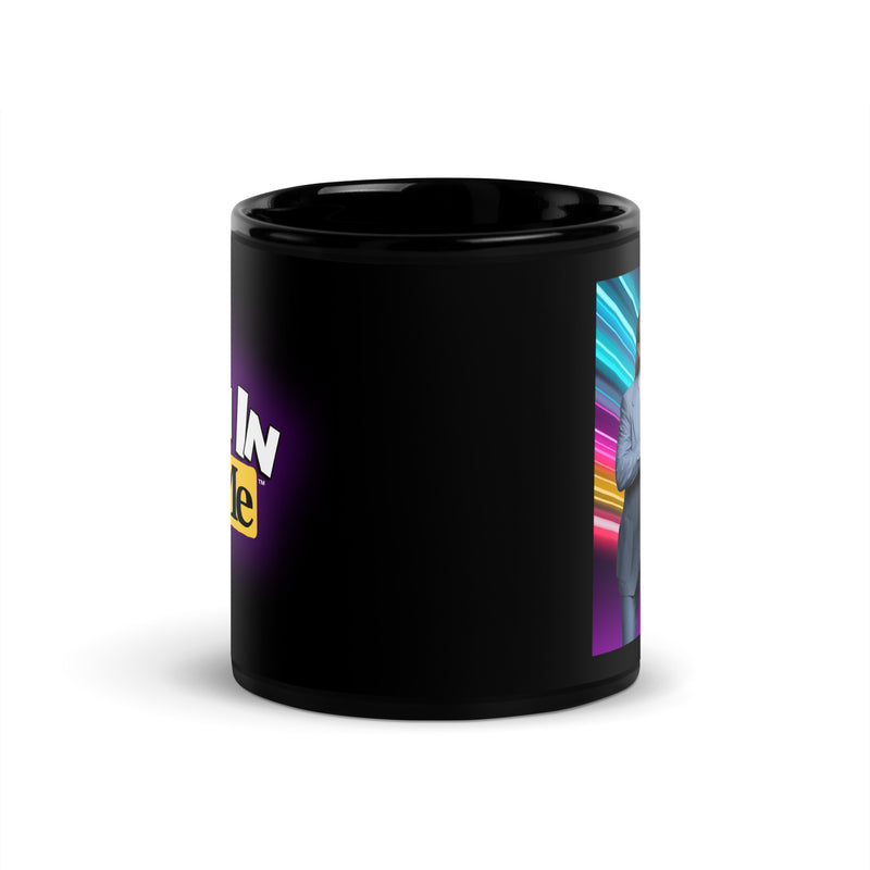 Side view of black ceramic mug with partial 'Toon In With Me' logo in white and yellow on the left and a neon-lit family portrait on the right