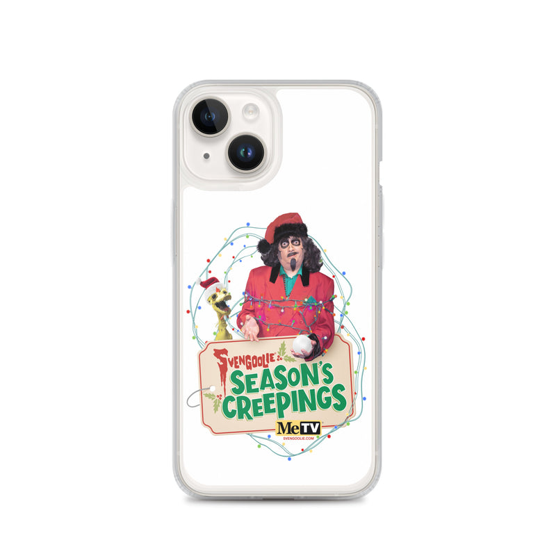 Back of a clear iPhone case on a white iPhone showing the Svengoolie and Kerwyn Season's Creepings design with string lights and a beige sign.