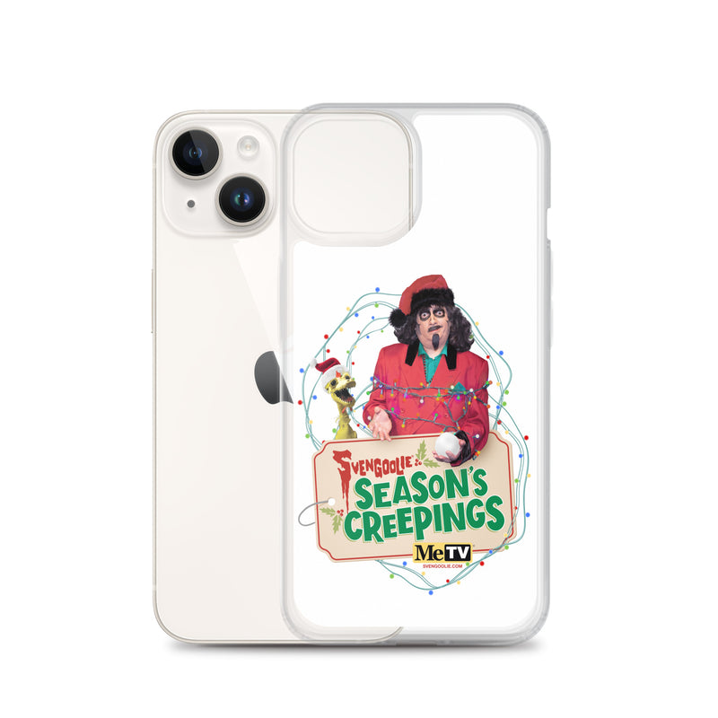 Clear case beside a white iPhone, showing the Svengoolie and Kerwyn Season's Creepings design printed on the case back.
