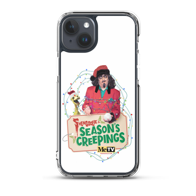 Clear case on a dark blue iPhone showing the Svengoolie and Kerwyn Season's Creepings design with string lights.