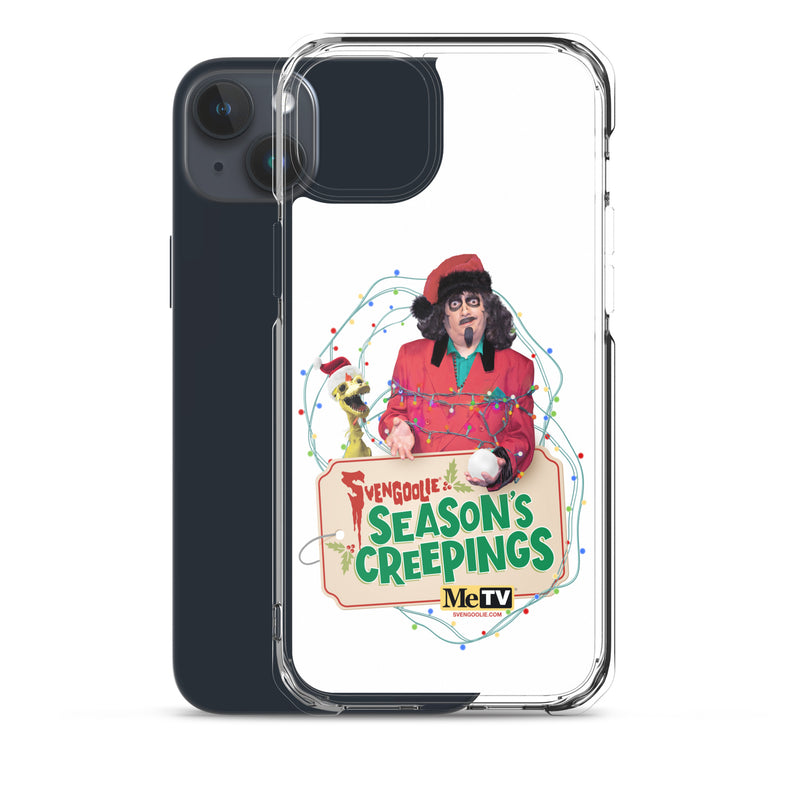 Angled view of clear case on a dark blue iPhone showing the Svengoolie and Kerwyn Season's Creepings design on the back.