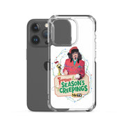 Angled view of clear case on a dark gray iPhone showing the Svengoolie and Kerwyn Season's Creepings design on the back.