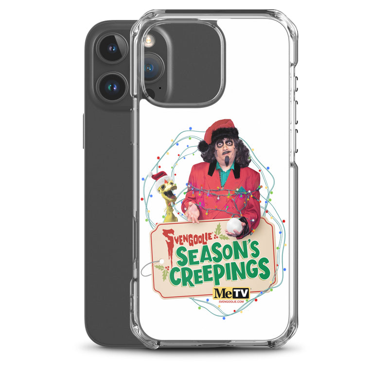 Angled view of the clear Svengoolie Christmas case on a dark phone, showing the raised camera lip and clear bumper edges.
