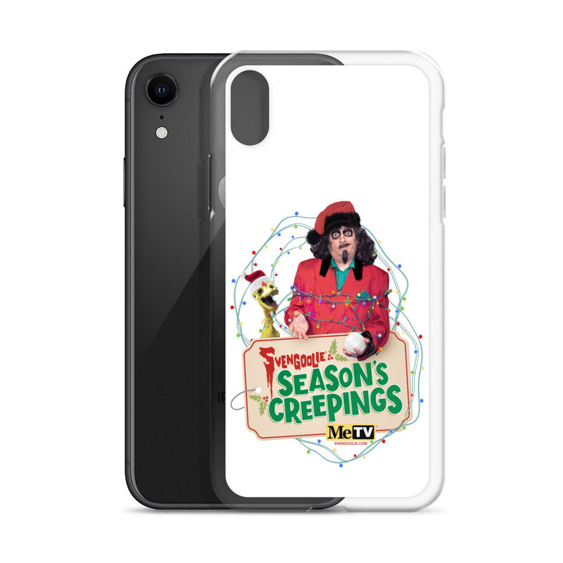 Clear iPhone case beside a black iPhone XR, showing the Sventa Claus and Kerwyn Season's Creepings design on the case front.