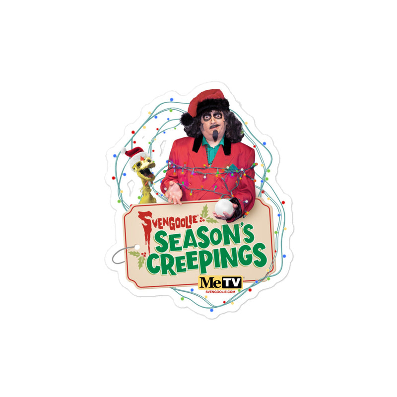 Multicolor die-cut sticker showing Svengoolie with string lights and Kerwyn the rubber chicken in a Santa hat.