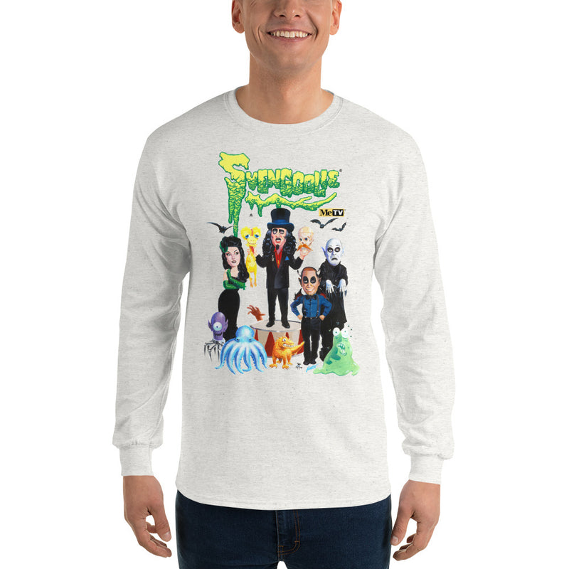 Model wearing gray long-sleeve shirt featuring Svengoolie and the Sven Squad alongside small monster characters with the text 'Svengoolie' in green dripping letters and a MeTV logo at the top.