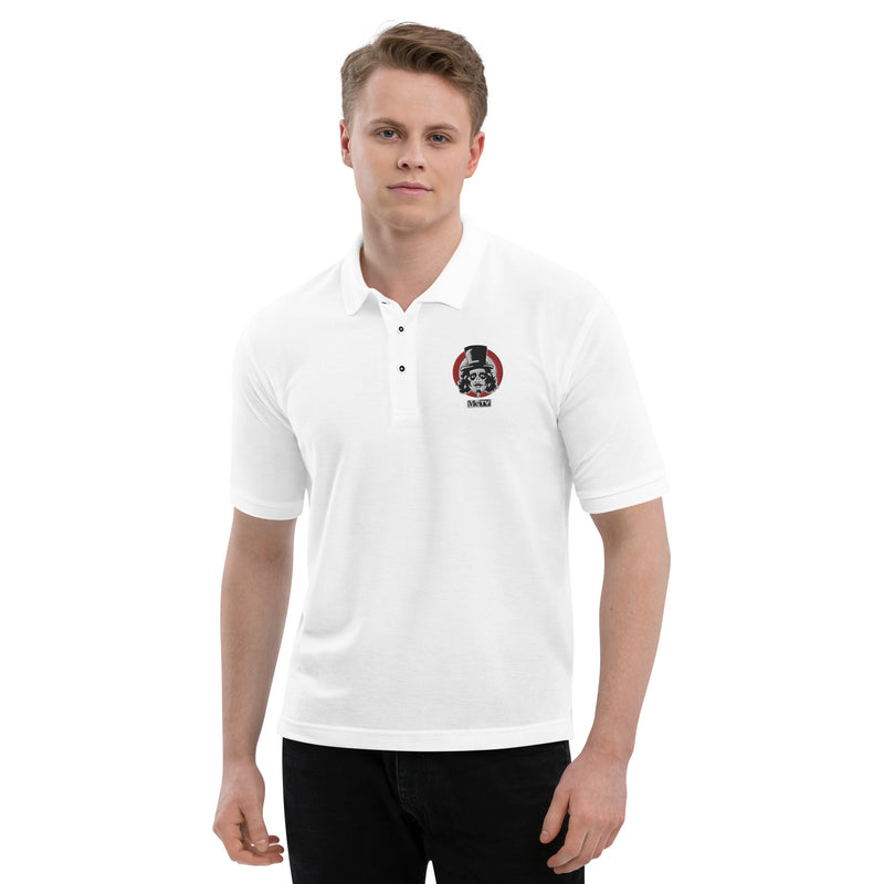 Model wearing White polo shirt with small embroidered Svengoolie logo on left chest: "MeTV" logo below.