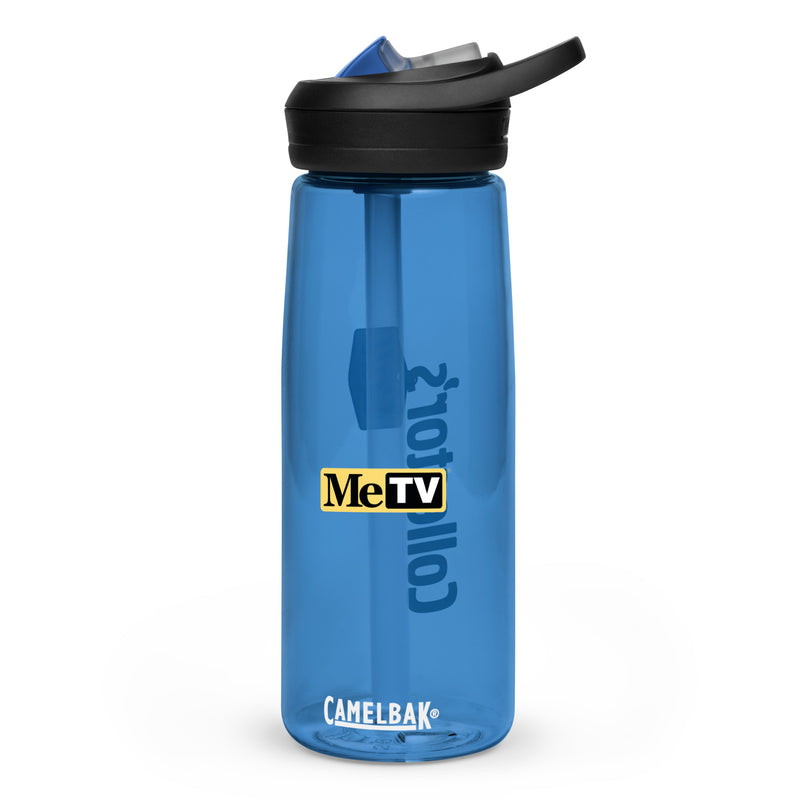 Blue water bottle with a black flip-top lid and straw, featuring the MeTV logo with the text 'Collector's Call' in dark blue vertically along the side and 'CamelBak' in white at the bottom.