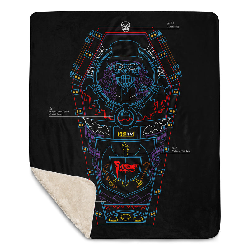 Black throw blanket with blue, red, and purple line art of a coffin, top-hat skeleton, and 'Svengoolie' logo. folded corner showing sherpa lining