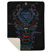 Black throw blanket with blue, red, and purple line art of a coffin, top-hat skeleton, and 'Svengoolie' logo. folded corner showing sherpa lining