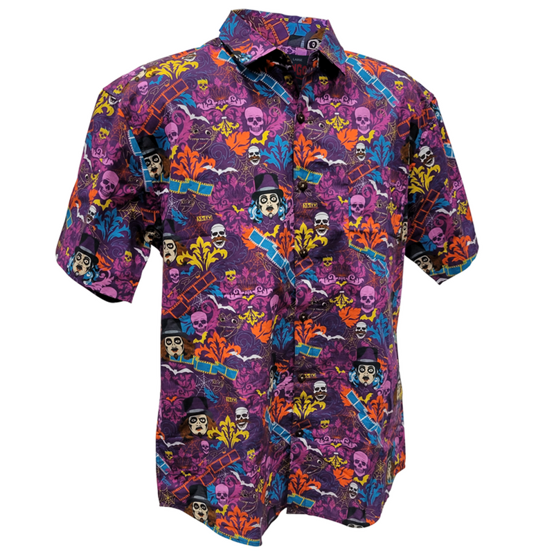 Short-sleeved button-up shirt in purple with an all-over print of skulls, Svengoolie face logos in top hats, bats, spider webs, and orange and yellow foliage.