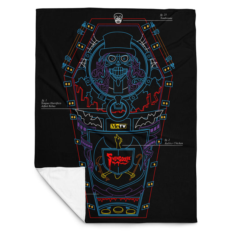 Black throw blanket with blue, red, and purple line art of a coffin, top-hat skeleton, and 'Svengoolie' logo. with lower left corner folded over