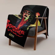 Black throw blanket draped over a chair with a Svengoolie character illustration featuring Svengoolie reaching forward and holding a yellow chicken, with the text 'Svengoolie' in red below him.