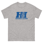 Heather gray short-sleeved t-shirt featuring the Heroes & Icons H&I logo in blue with the text 'HEROES & ICONS' in blue below it.