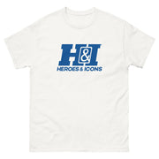 White short-sleeved t-shirt featuring the Heroes & Icons logo with the text 'HEROES & ICONS' in blue below a large blue 'H&I' monogram.