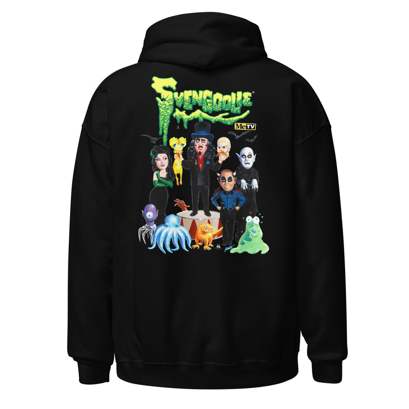 Back view of black hoodie featuring Svengoolie and the Sven Squad alongside small monster characters with the text 'Svengoolie' in green dripping letters and a MeTV logo at the top.