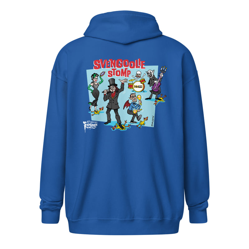 Back view of blue zip-up hoodie featuring a cartoon band of Svengoolie characters with red SVENGOOLIE STOMP text above. Svengoolie logo at lower left