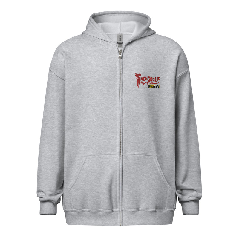 Front view of heather gray zip-up hoodie with a hood and kangaroo pocket, featuring the Svengoolie logo with the text 'Svengoolie' in red and 'MeTV' in black on yellow at the upper left chest.