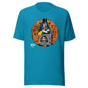 Aqua t-shirt featuring Svengoolie holding a rubber chicken, by a TV with Orange circle border. Svengoolie logo at lower left.