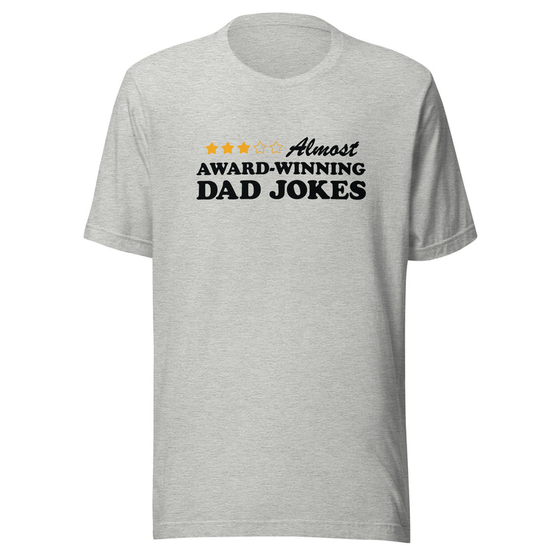 Heather gray t-shirt featuring a three-of-five star rating graphic with the text 'Almost AWARD-WINNING DAD JOKES' in black on the chest.