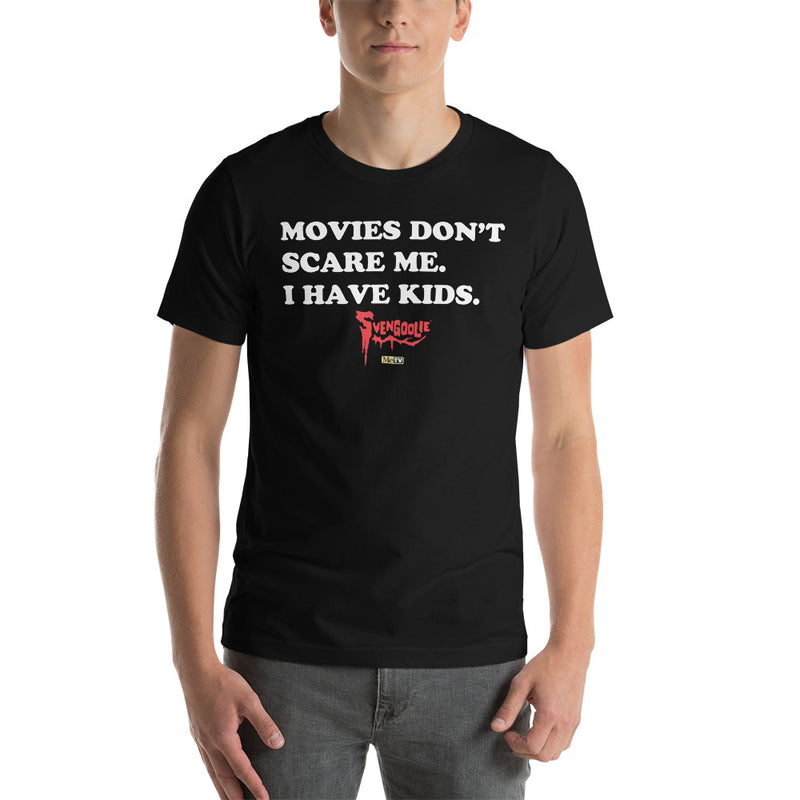 Black t-shirt with white text reading 'MOVIES DON'T SCARE ME. I HAVE KIDS.' and a red Svengoolie logo with a MeTV logo below.