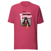 Heather red t-shirt featuring Svengoolie holding a rubber chicken with the text 'This Grandma Watches Svengoolie' in black and white above it.
