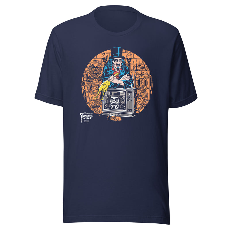 Navy t-shirt featuring Svengoolie holding a rubber chicken, by a TV with Orange circle border. Svengoolie logo at lower left.