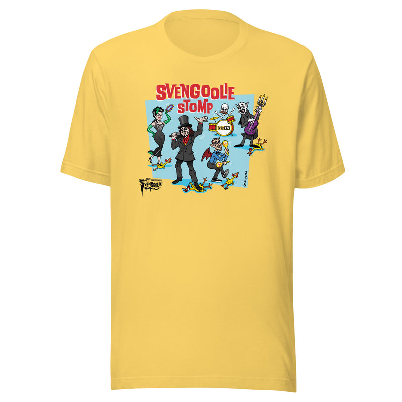 Yellow t-shirt featuring a cartoon band of Svengoolie characters with red 'SVENGOOLIE STOMP' written above and Svengoolie logo at lower left