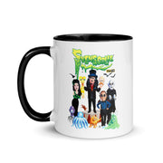 White mug with black interior and handle featuring Svengoolie and the Sven Squad alongside small monster characters with the text 'Svengoolie' in green dripping letters and a MeTV logo at the top.