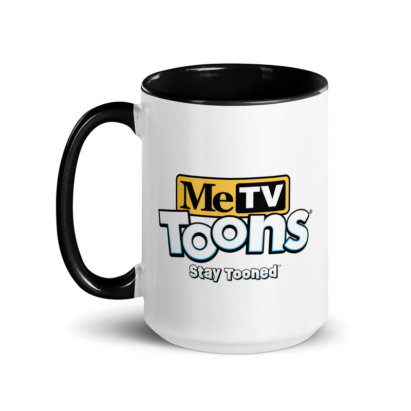 White ceramic mug with black interior and handle featuring the MeTV Toons logo with the text 'MeTV Toons' and 'Stay Tooned' in black and blue below it