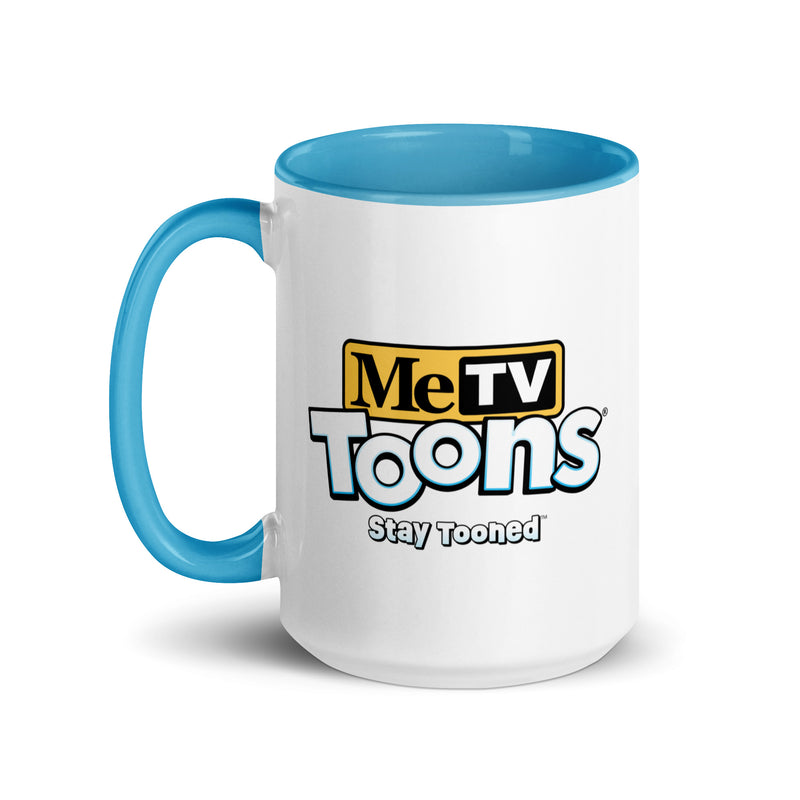 White ceramic mug with blue handle and interior featuring the MeTV Toons logo with the text 'MeTV Toons' and 'Stay Tooned' below in black and blue.