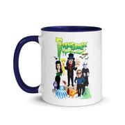 White mug with navy handle featuring Svengoolie and the Sven Squad alongside small monster characters with the text 'Svengoolie' in green dripping letters and a MeTV logo at the top.