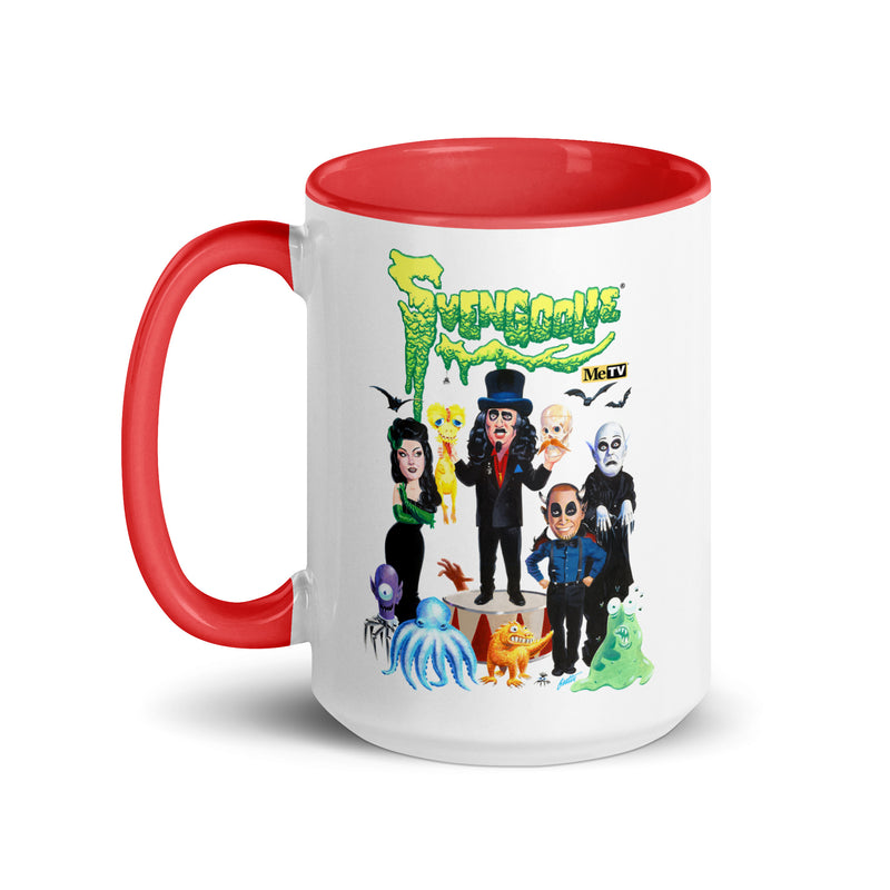 White ceramic mug with red handle and interior featuring Svengoolie and the Sven Squad alongside small monster characters with the text 'Svengoolie' in green dripping letters and a MeTV logo at the top.