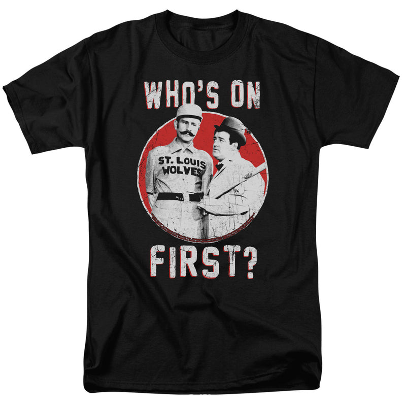Black t-shirt with white text "WHO'S ON FIRST?" above and below a red circle showing two men in vintage baseball and suit attire.
