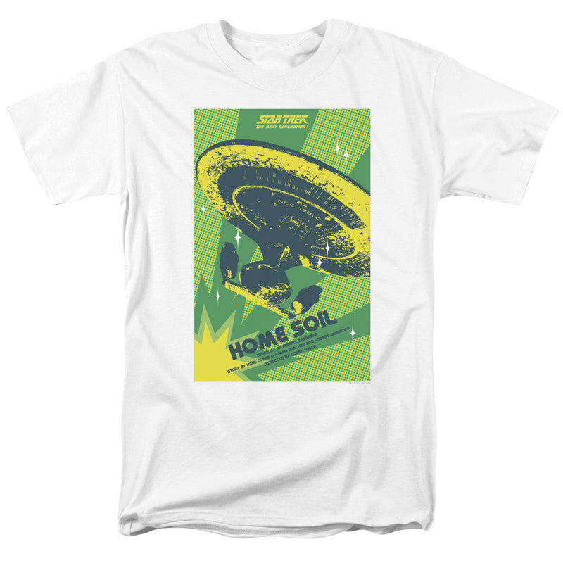 White t-shirt with a green and yellow pop-art print of the Enterprise-D starship and 'STAR TREK THE NEXT GENERATION' logo, plus 'HOME SOIL' text.