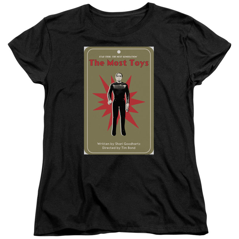 Women's fitted black t-shirt showing the same 'The Most Toys' toy-card graphic with a uniformed figure and red title.